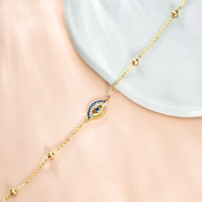 Pulsera con dije de ojo del diablo de circonita cúbica en oro de 14 quilates-4