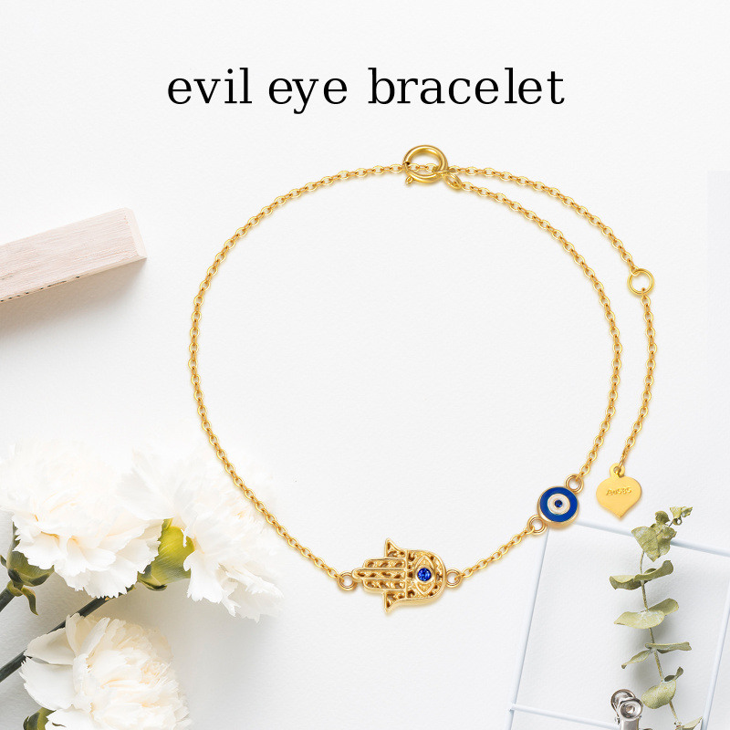 Pulsera con dije de ojo turco y mano de Fátima en oro de 18 quilates con circonitas cúbicas-6