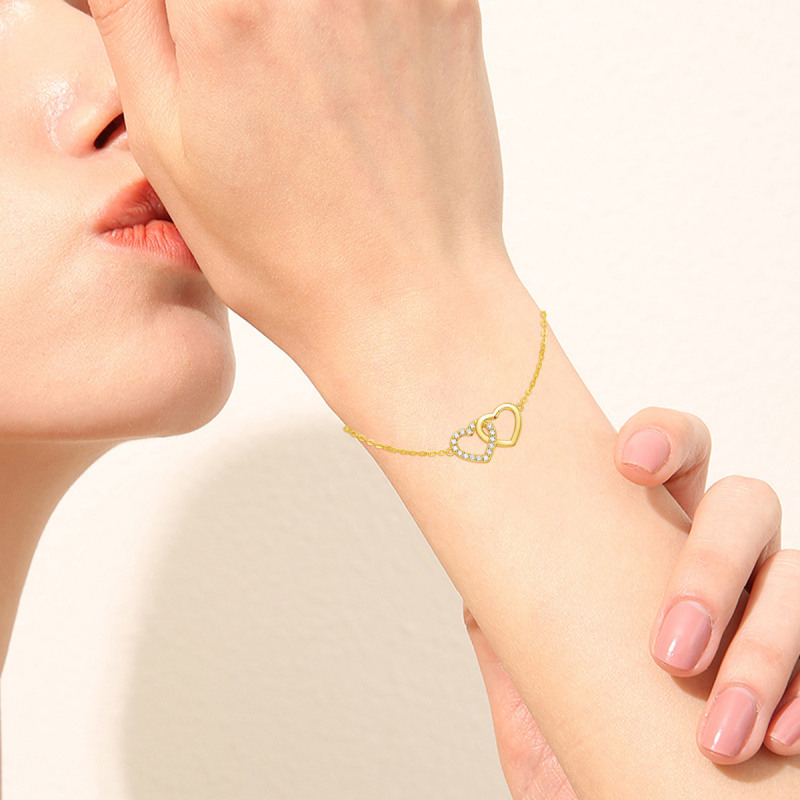 Pulseira com pendente coração em ouro rosa 18K e zircónias cúbicas-2