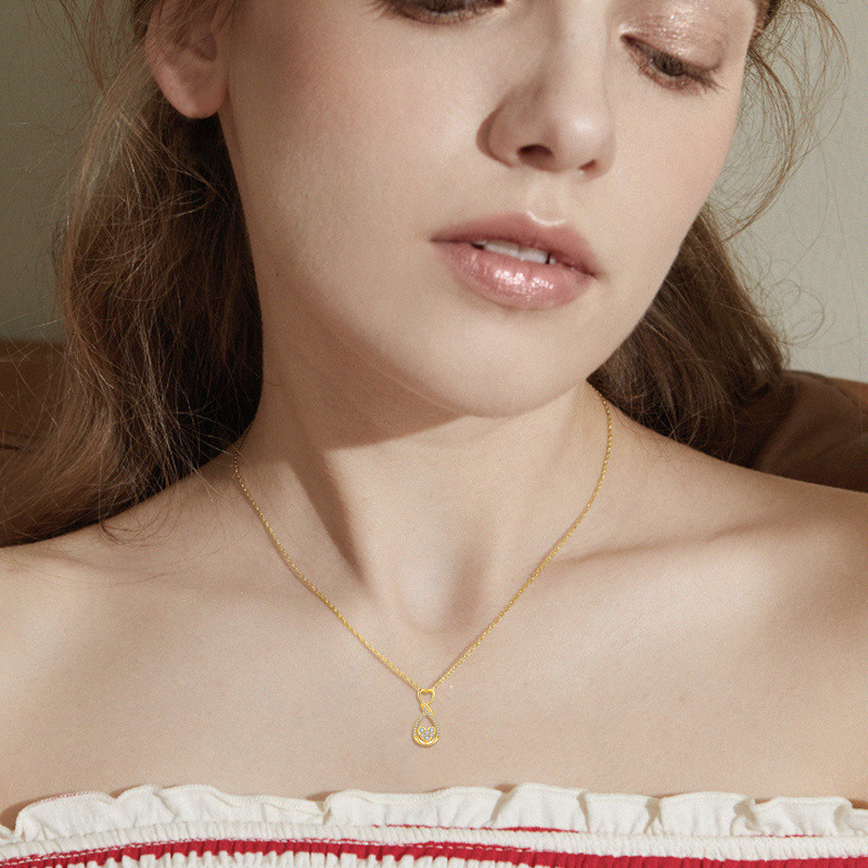 Collar con colgante de corazón y símbolo de infinito en oro de 14 quilates con circonitas cúbicas-2