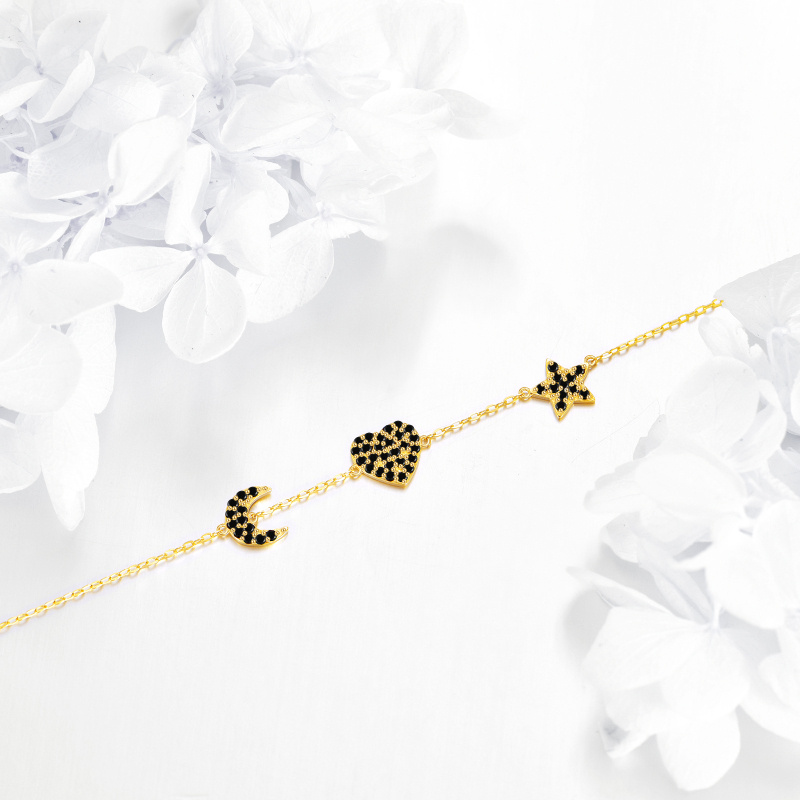 Pulsera con dije de corazón, luna y estrella de circonita cúbica en oro de 14 quilates-3