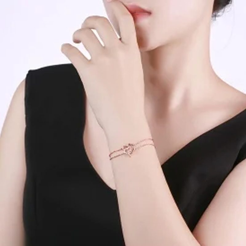 Pulsera de oro rosa de 14 quilates con circonitas cúbicas en forma de corazón con otro corazón, de varias capas.-2
