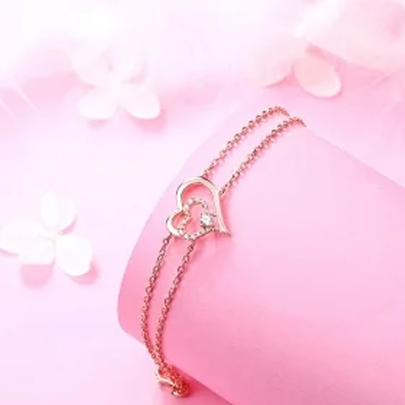 Pulsera de oro rosa de 14 quilates con circonitas cúbicas en forma de corazón con otro corazón, de varias capas.-3