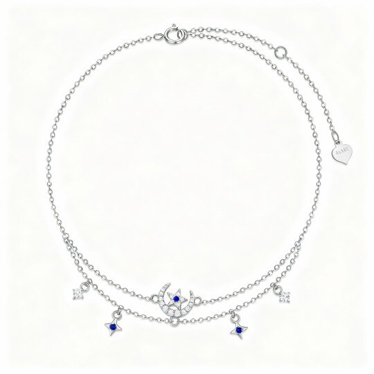 Tobillera de oro blanco de 10 quilates con circonitas cúbicas, diseño de luna y estrella con múltiples capas y dijes.