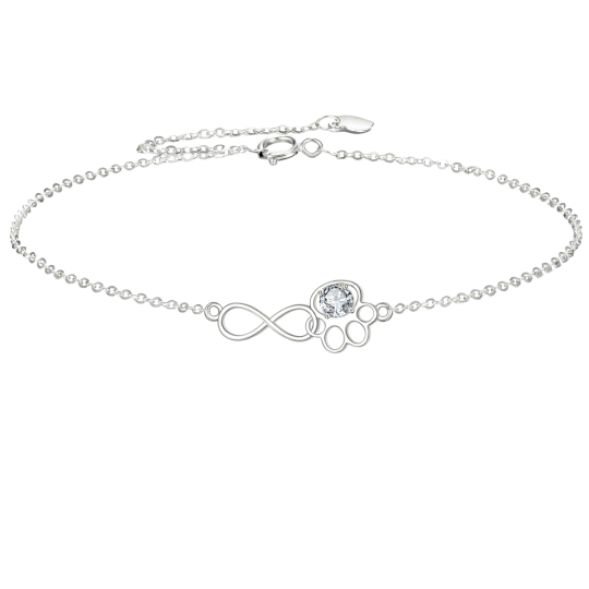 Pulsera con dije de huella de pata de circonita cúbica en oro blanco de 18 quilates