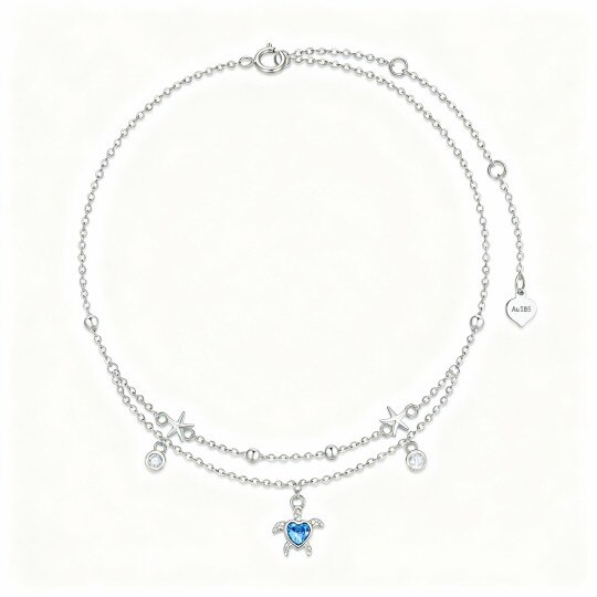 Bracelet de cheville à plusieurs rangs avec breloques tortue de mer et étoile de mer en or blanc 10 carats et zirconiums cubiques