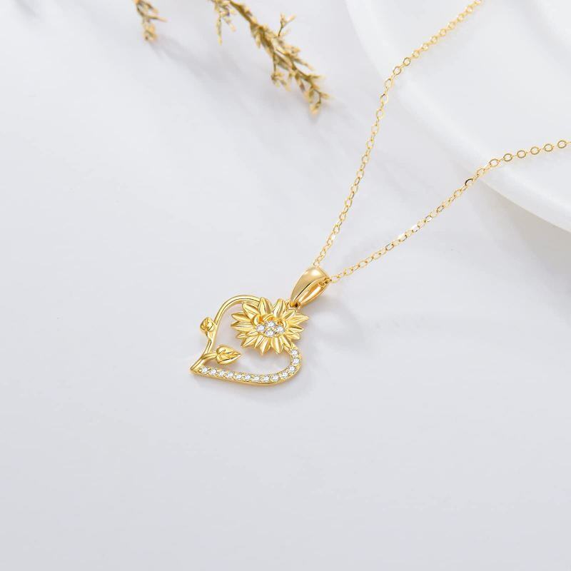 Collar con colgante de girasol y corazón de circonita cúbica en oro de 10 quilates-3