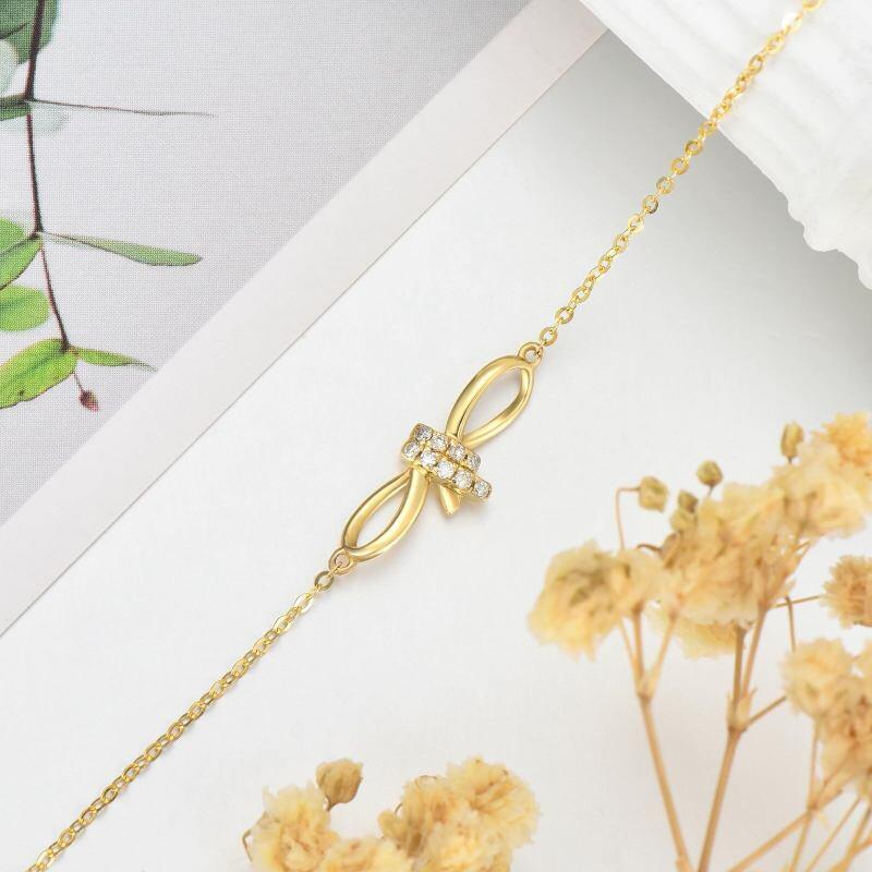 Bracelet en or 14 carats avec pendentif nœud et cœur en diamants-5