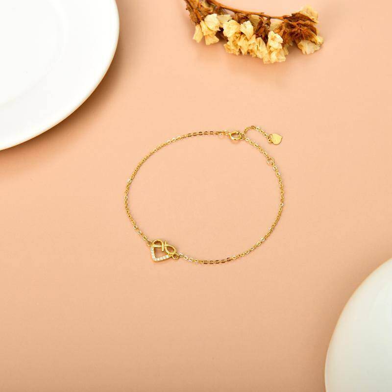 Pulsera con dije de símbolo infinito de oro de 14 quilates y diamantes-3