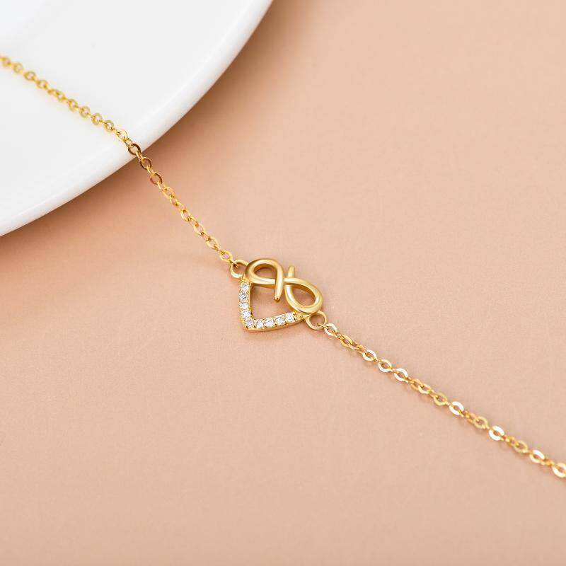 Pulsera con dije de símbolo infinito de oro de 14 quilates y diamantes-4