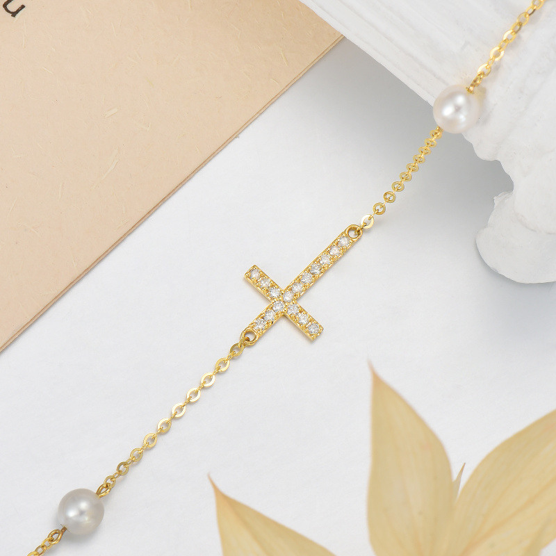 Armband aus 10-karätigem Gold mit Diamanten und Perlen in Kreuzform-5