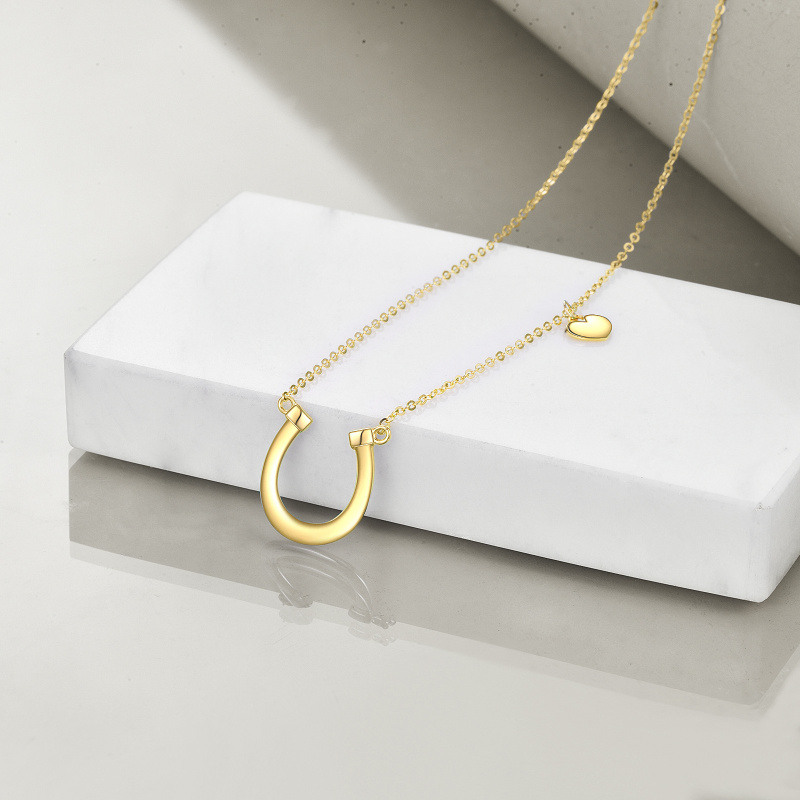 Collar con colgante de corazón y herradura de oro rosa de 10 quilates-4