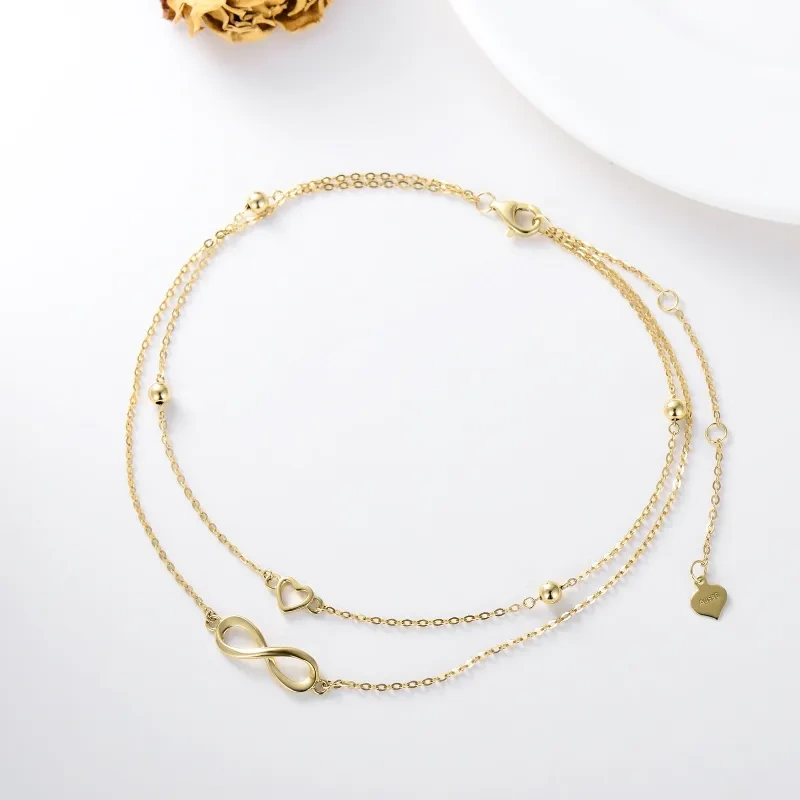 Bracelet de cheville à breloques multicouches en or rose 14 carats avec cœur et symbole de l'infini-3