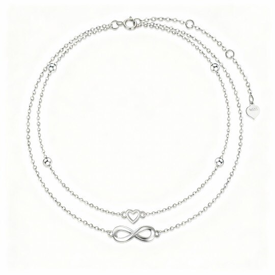 Bracelet de cheville à breloques multicouches en or blanc 10 carats avec cœur et symbole de l'infini