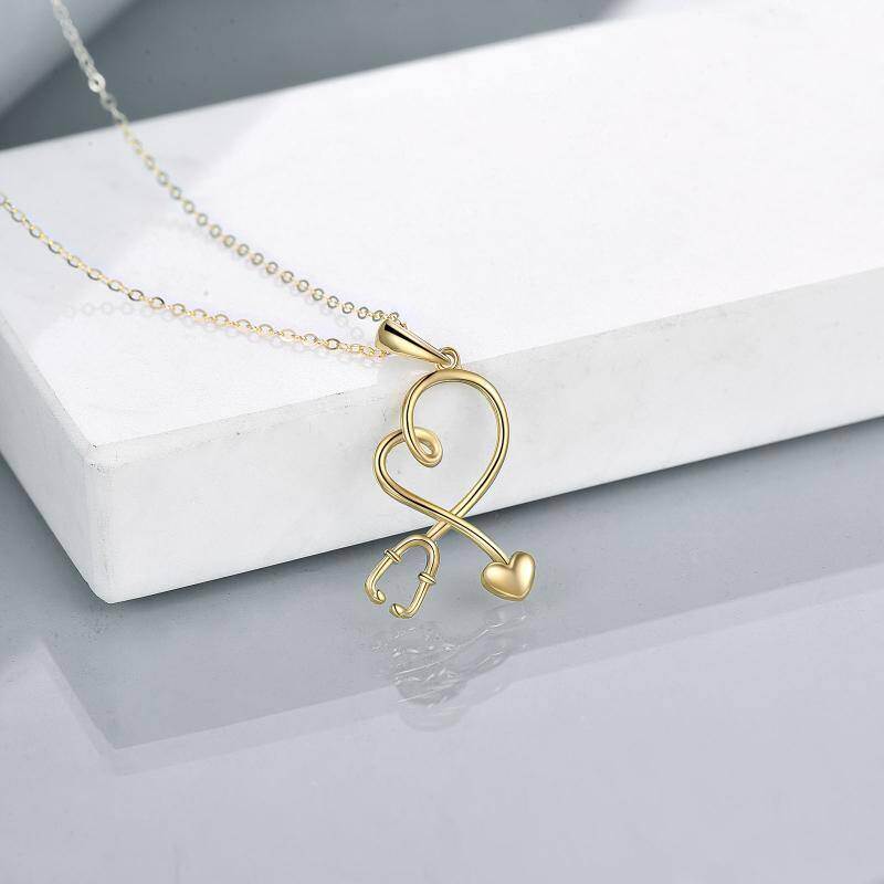 Collar con colgante de corazón y estetoscopio en oro rosa de 10 quilates-3