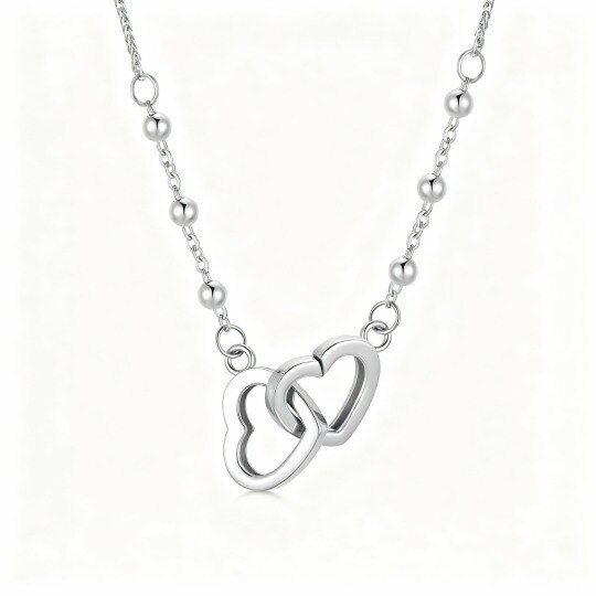 Collier pendentif cœur en or blanc 10 carats