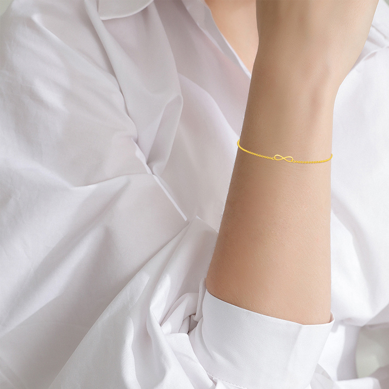 Pulsera con dije del símbolo del infinito en oro de 10 quilates-2