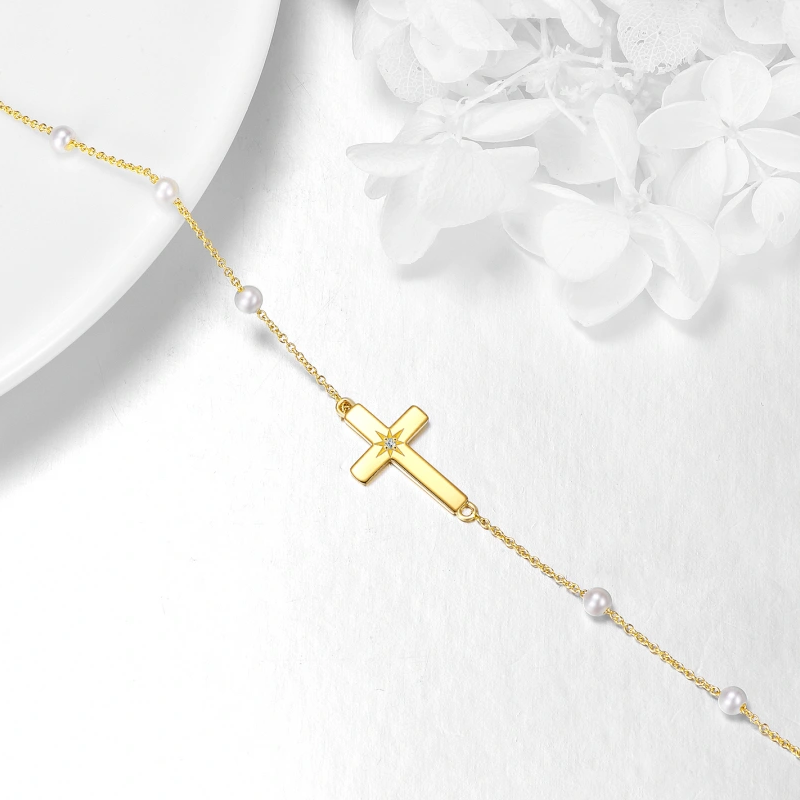 Armband mit Kreuzanhänger aus 10-karätigem Gold, Moissanit und Perle-3