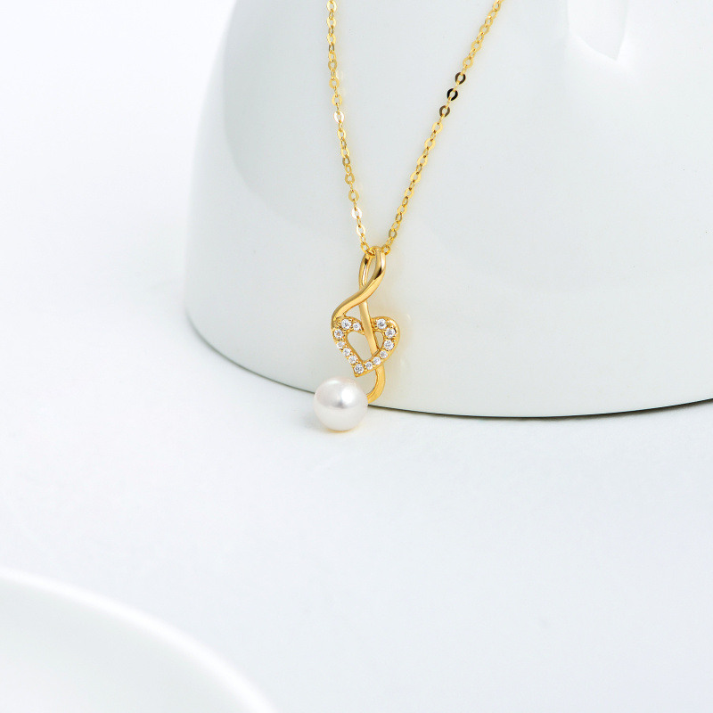 Collar con colgante de corazón con símbolo musical, perla y moissanita en oro de 18 quilates-4
