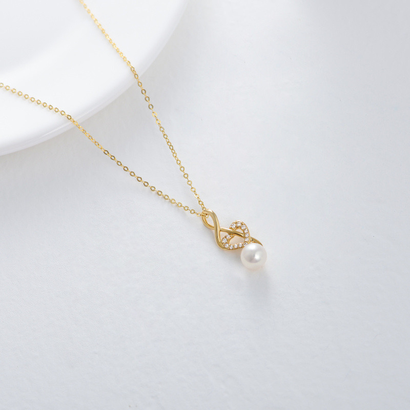 Collar con colgante de corazón con símbolo musical, perla y moissanita en oro de 18 quilates-5