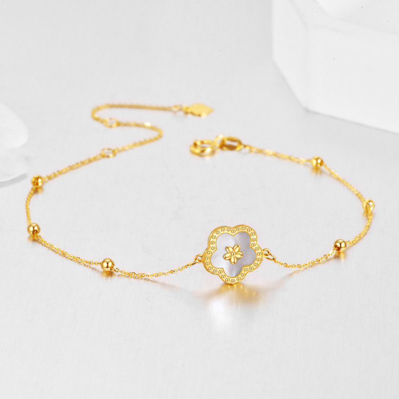 Pulsera de oro de 18 quilates con dije de margarita y cuentas de nácar-3