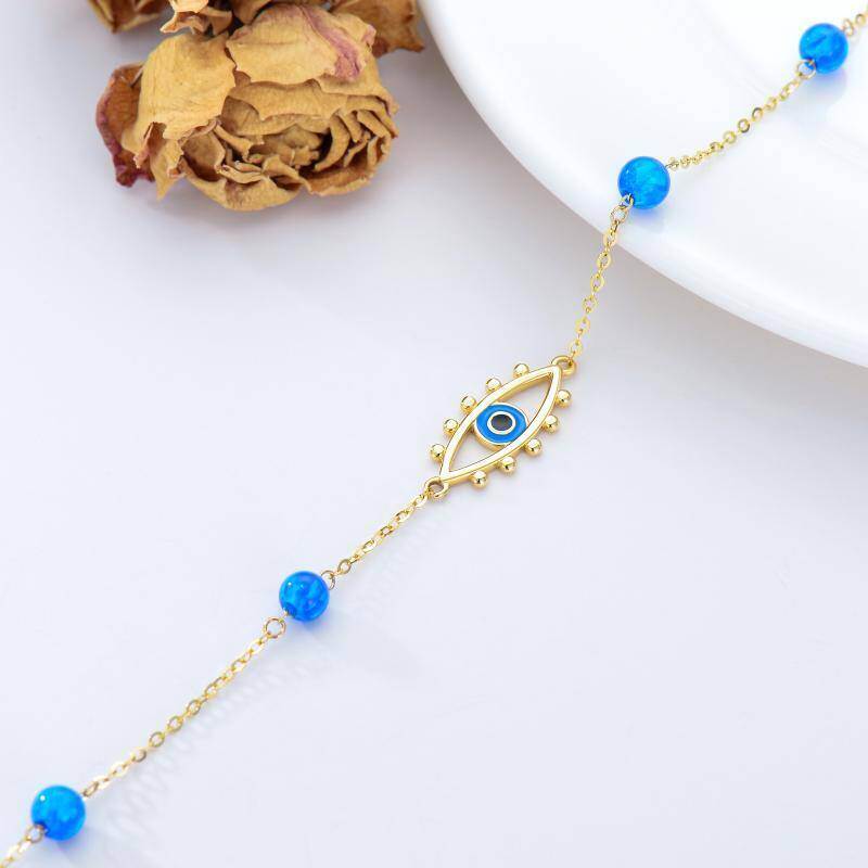 Pulsera con dije de ojo turco de ópalo y oro de 18 quilates-5