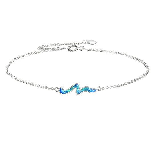 Pulsera con dije de olas de ópalo en oro blanco de 18 quilates