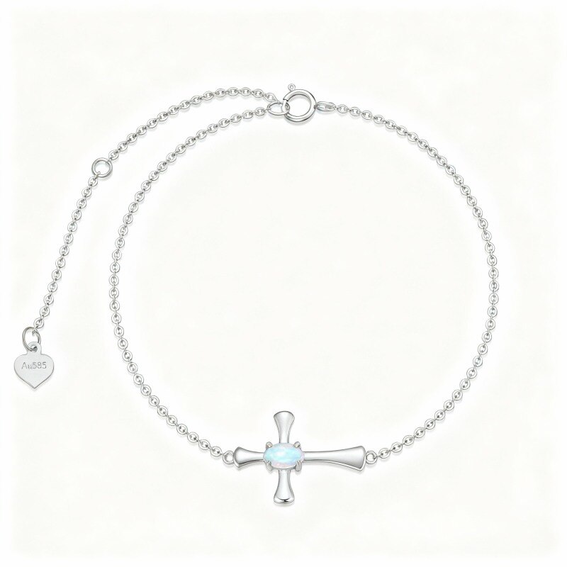 Bracelet en platine plaqué or blanc avec breloque croix en opale ovale.-1