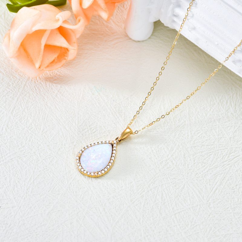 Halskette aus 14-karätigem Gold mit tropfenförmigem Anhänger aus birnenförmigem Zirkonia und Opal.-4