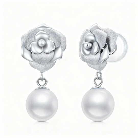 Boucles d'oreilles pendantes en or blanc 10 carats et perles