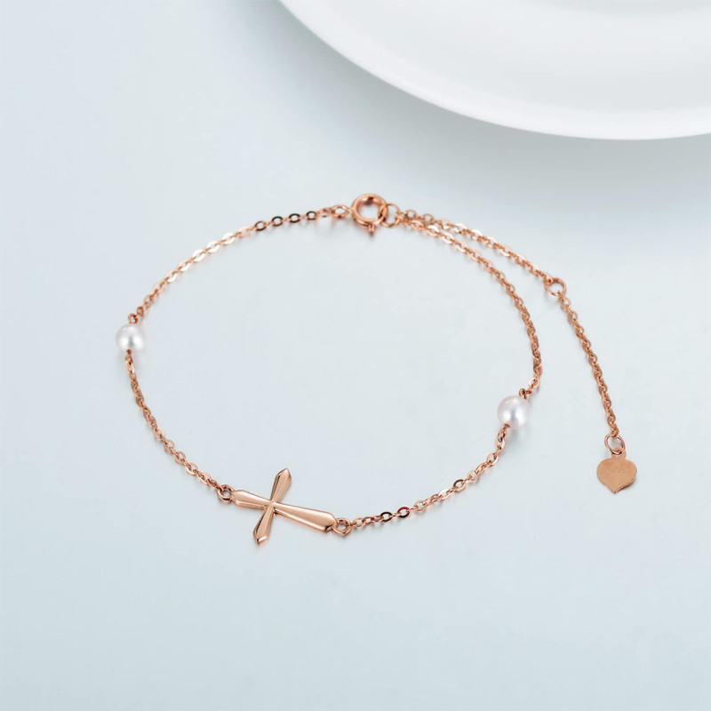Pulsera con dije de cruz de perlas en oro rosa de 18 quilates-5