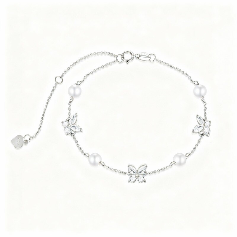 Pulsera con dije de mariposa de oro blanco de 14 quilates, perla y circonita cúbica-1