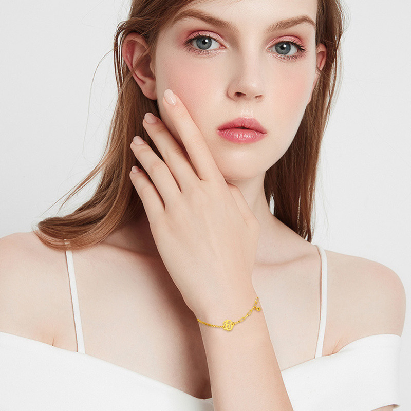 Pulseira com pendente de rosa e bola em ouro rosa 10K-2