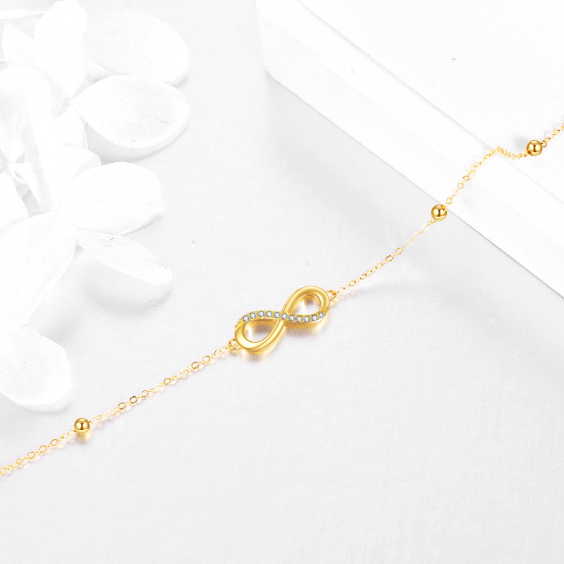 18K Yellow Gold Circular Cubic Zirconia Infinity Symbol Charm Bracelet-3