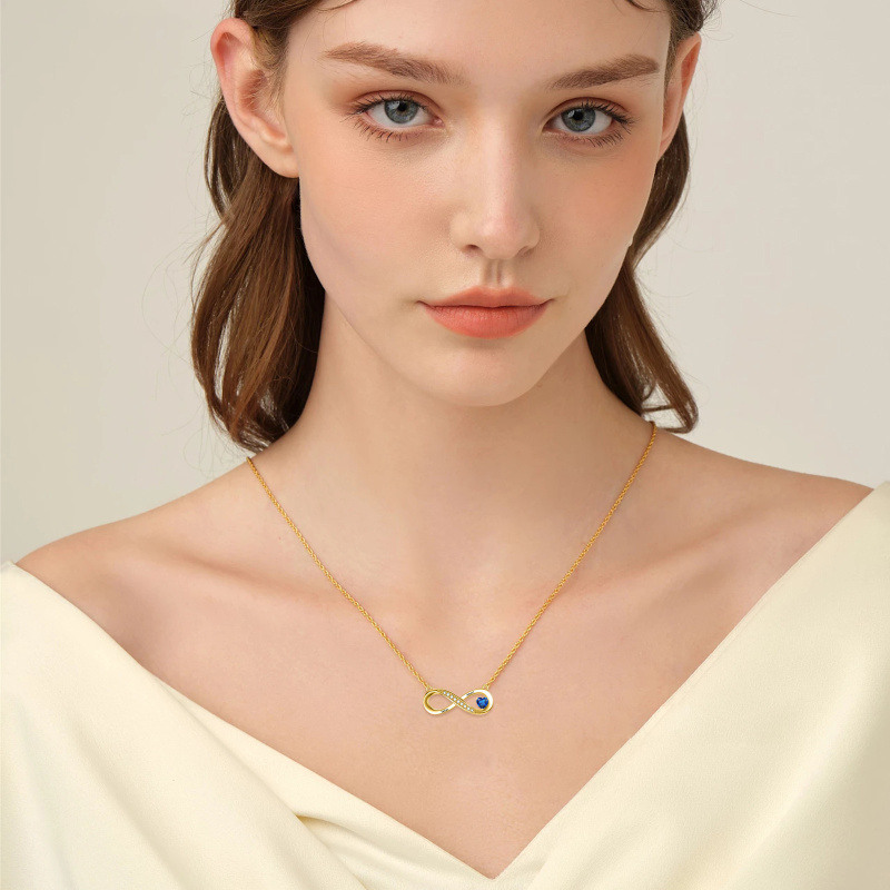 Collar con colgante de símbolo infinito circular de circonita cúbica en oro de 10 quilates-2