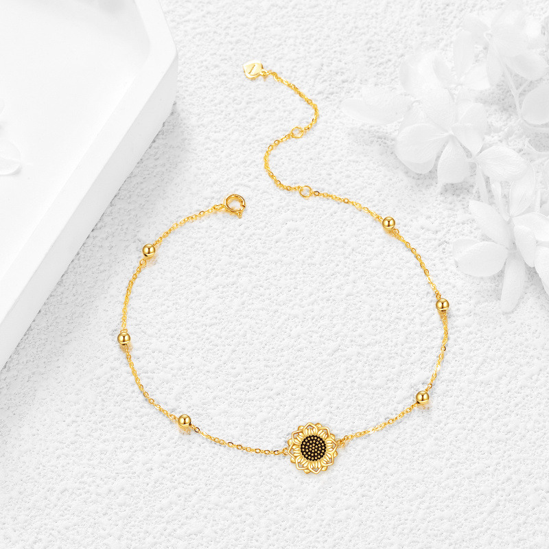 Armband aus 10-karätigem Gold mit Sonnenblumen- und Perlenanhänger-4