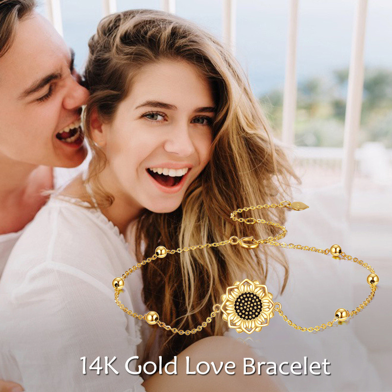 Armband aus 10-karätigem Gold mit Sonnenblumen- und Perlenanhänger-6