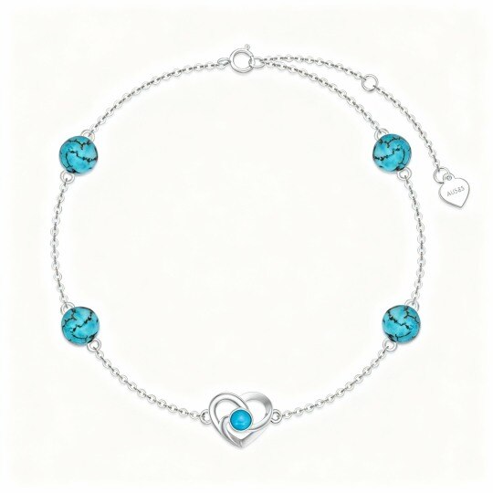 Pulsera de oro blanco de 10 quilates con nudo celta turquesa y corazón con dije de corazón