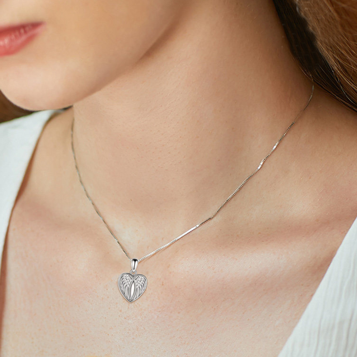 Collana d'argento con ala d'angelo e cuore per le ceneri con parola incisa-2