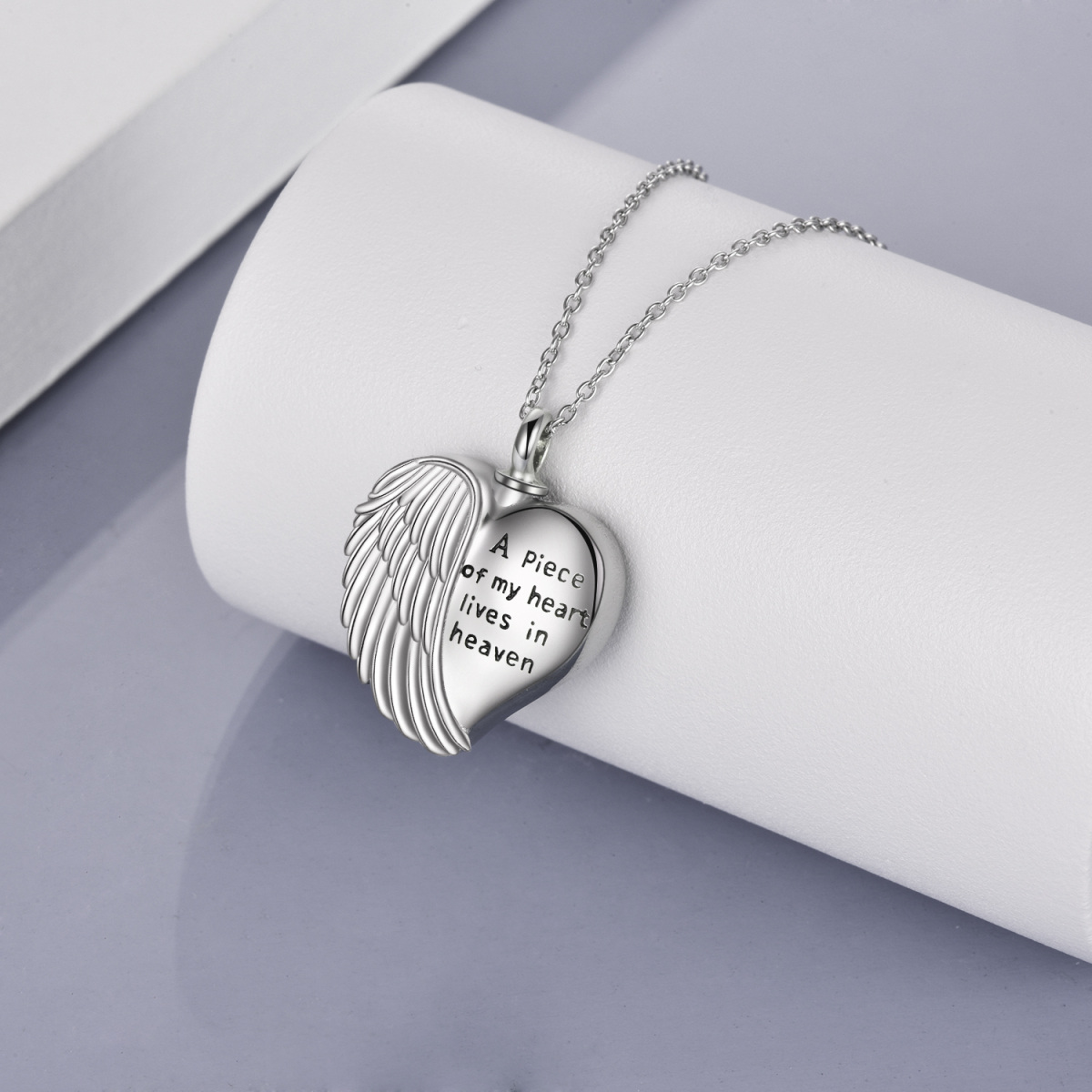 Collar de urna con forma de corazón y ala de ángel de plata de ley para cenizas con grabado "Un pedazo de mi corazón está en el cielo"-5