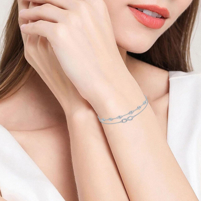 Cavigliera multistrato con simbolo dell'infinito e pietra portafortuna di aprile in argento sterling con zirconia cubica-2