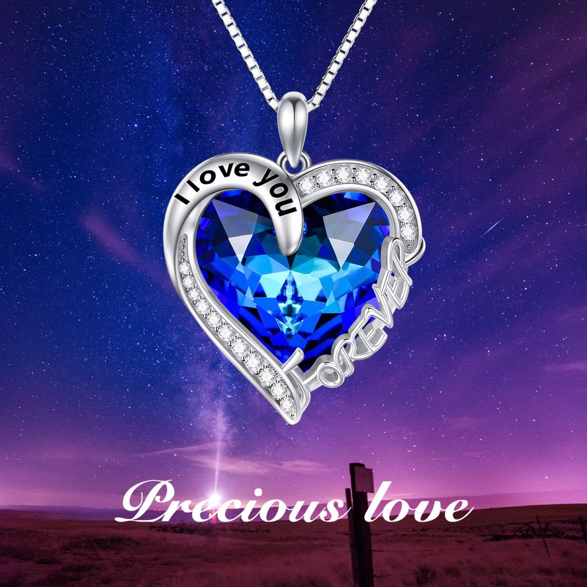 Collana con ciondolo di cristallo a forma di cuore blu in argento sterling con l'incisione 