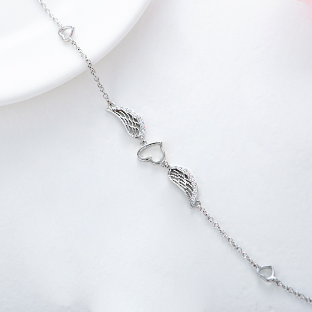 Bracciale circolare in argento sterling con ciondolo a forma di ala di angelo e cuore in zirconia cubica-4