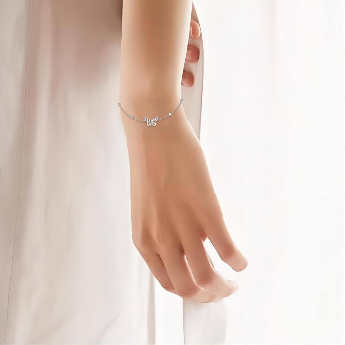 Pulsera de plata de ley con forma circular de cristal y colgante de mariposa-2