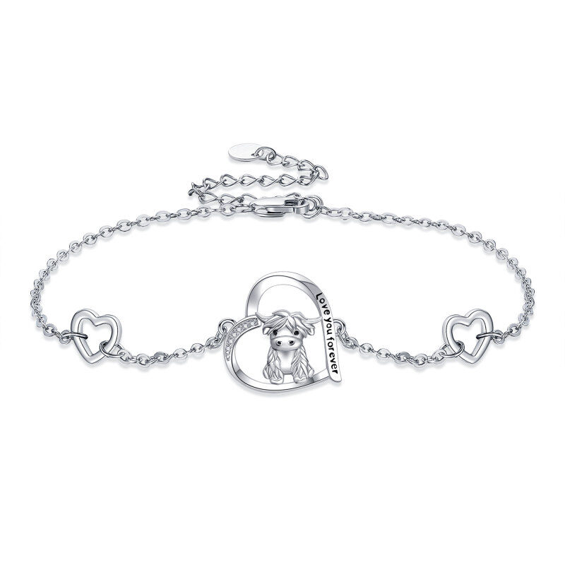 Sterling Silver Circular Shaped Cubic Zirconia Highland Cow & Heart Charm Bracelet with Engraved Word