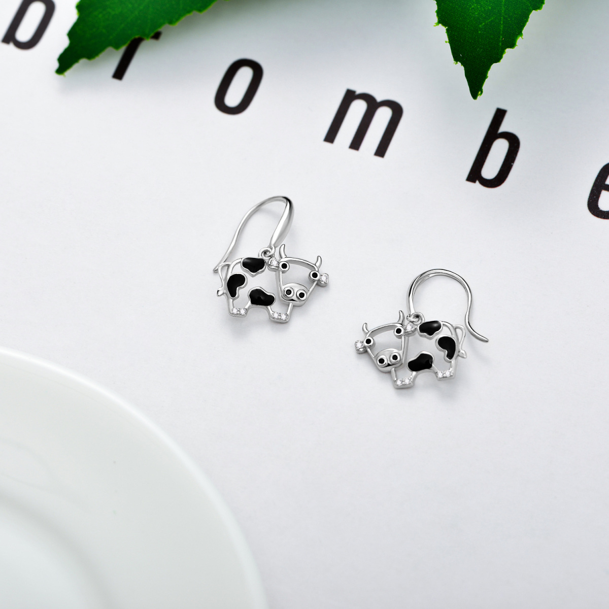 Sterling Silver Cubic Zirconia Cow Drop Earrings-4