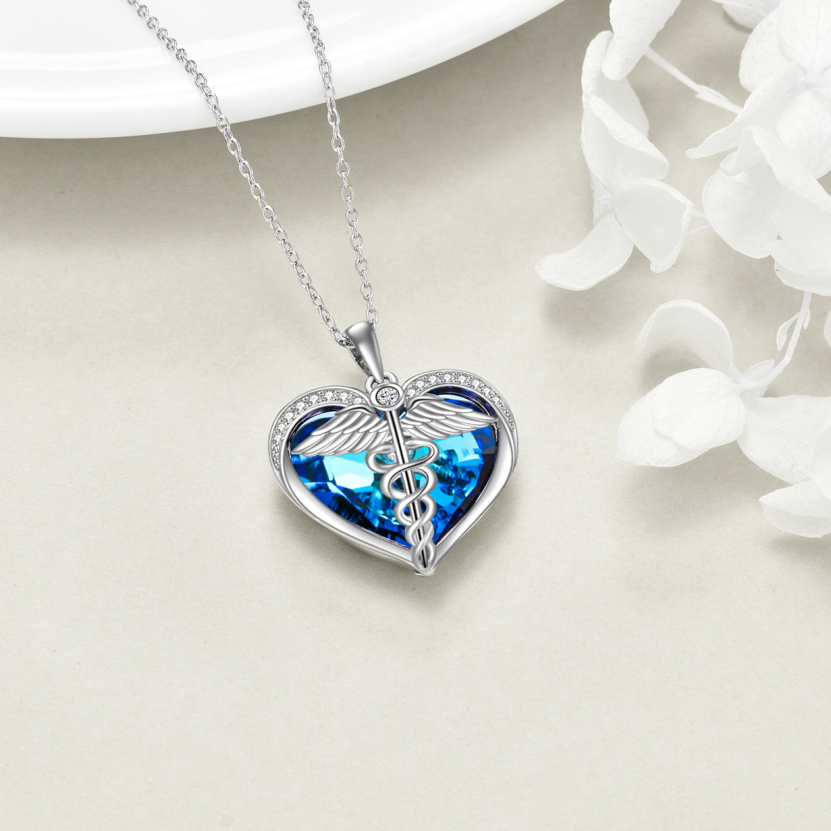 Collana con ciondolo a forma di cuore in argento sterling con serpente e piuma e cristallo blu per donna-4