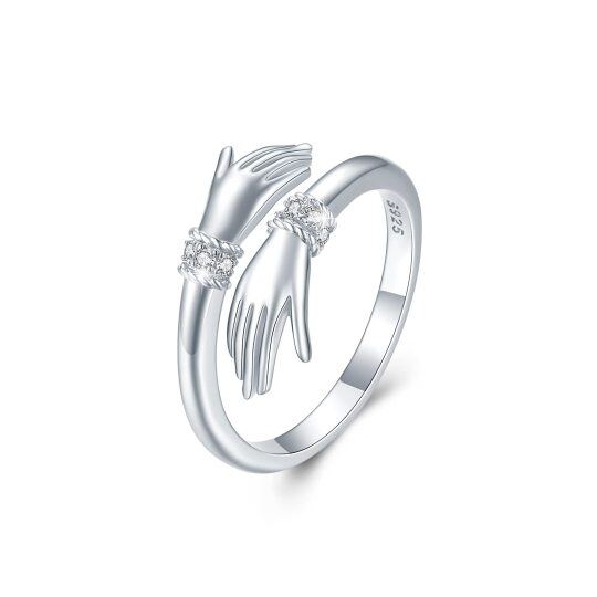 Bague en argent sterling avec oxyde de zirconium tenant la main ouverte