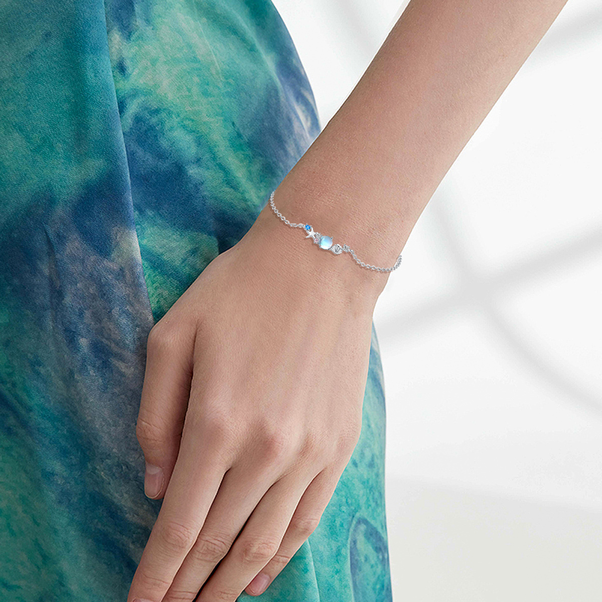 Pulsera de plata de ley con circonita cúbica y estrella de mar-2