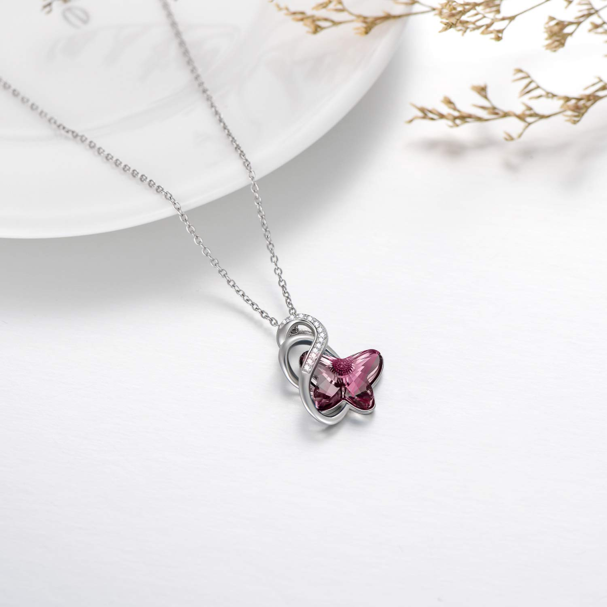 Halskette mit Schmetterlings-Anhänger und Unendlichkeitssymbol aus Sterlingsilber mit rosa Kristallen-4